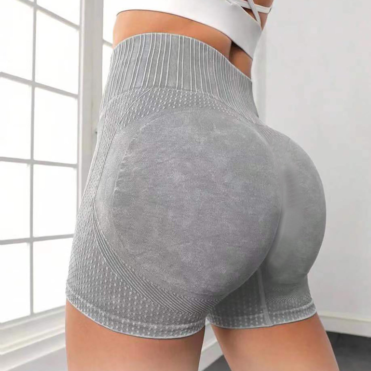 Hoch taillierte hüfthebende Fitnesshose