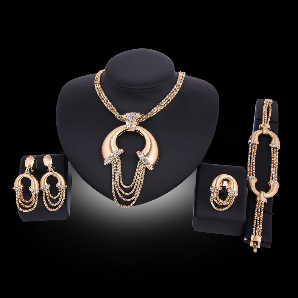Vierteilige Schmuck-Set aus galvanisiertem Metall