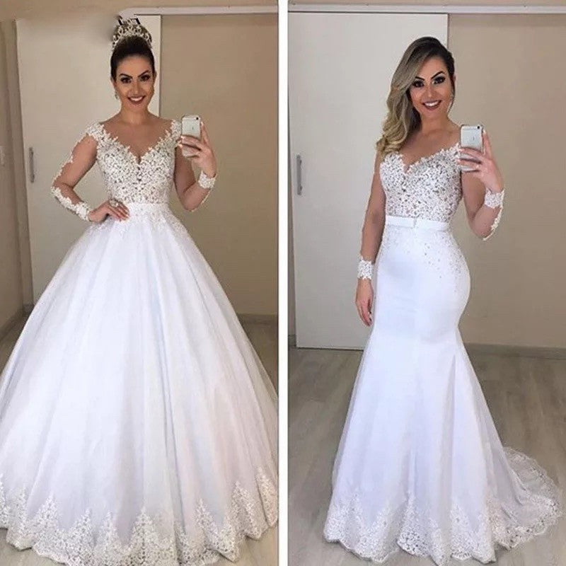 Romantisches Brautkleid mit aufwendigen Applikationen und langen Ärmeln